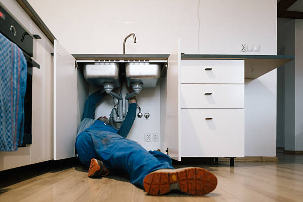 Professional Emergency Plumber technician working in Oberlin, KS